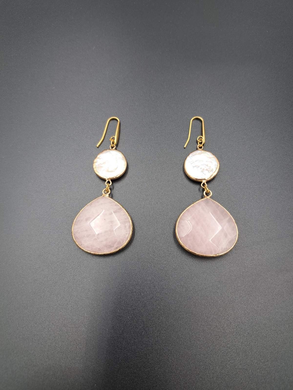 Pair of gold-plated dangle earrings with white round top and faceted pink teardrop stones
