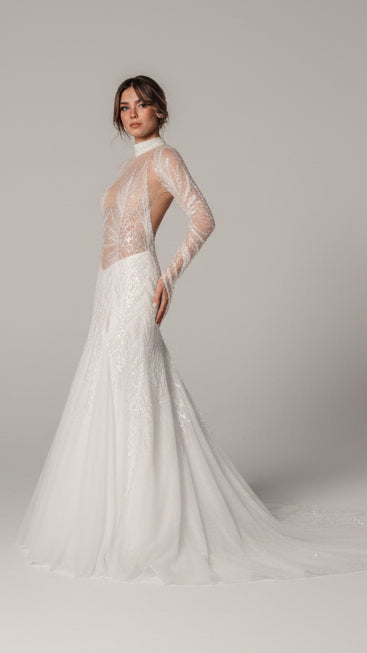 Woman in a white wedding dress standing