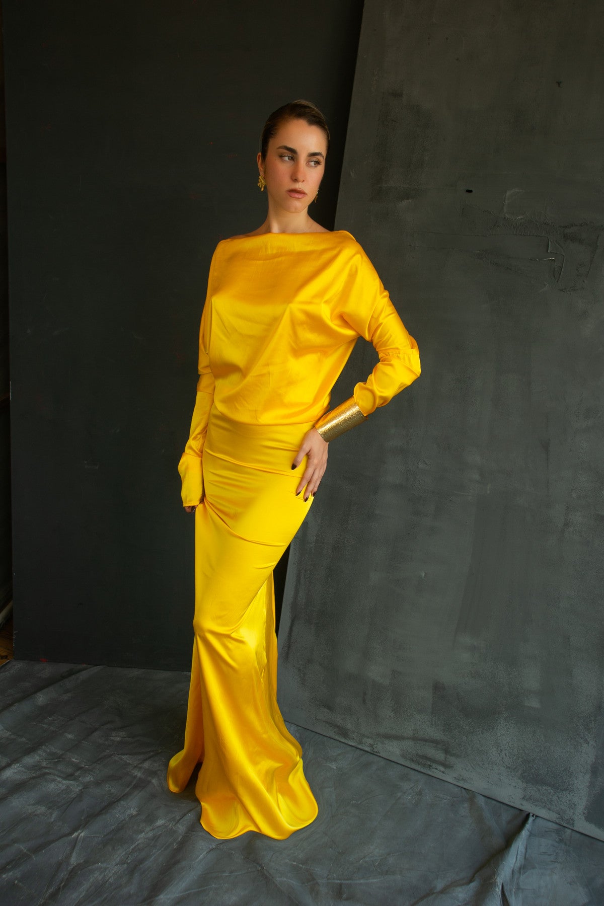 Chryseis golden satin gown by Calliope Anemouli